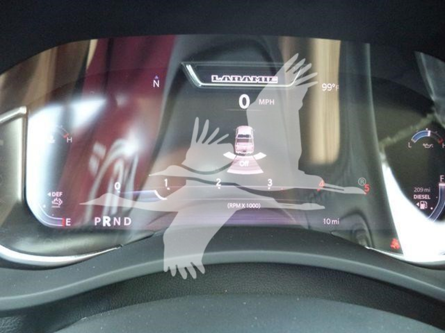 Ram 5500 truck dashboard screen showing Winch category display and 0 mph speed in digital gauge, with vehicle icons and fuel gauge.