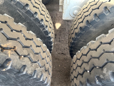 Ranco LW21-40 trailer wheels and tire treads as seen from between dual axles.