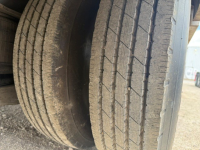 Trailer wheel close-up showing tread pattern and sidewall on the TE70 XTS trailer.