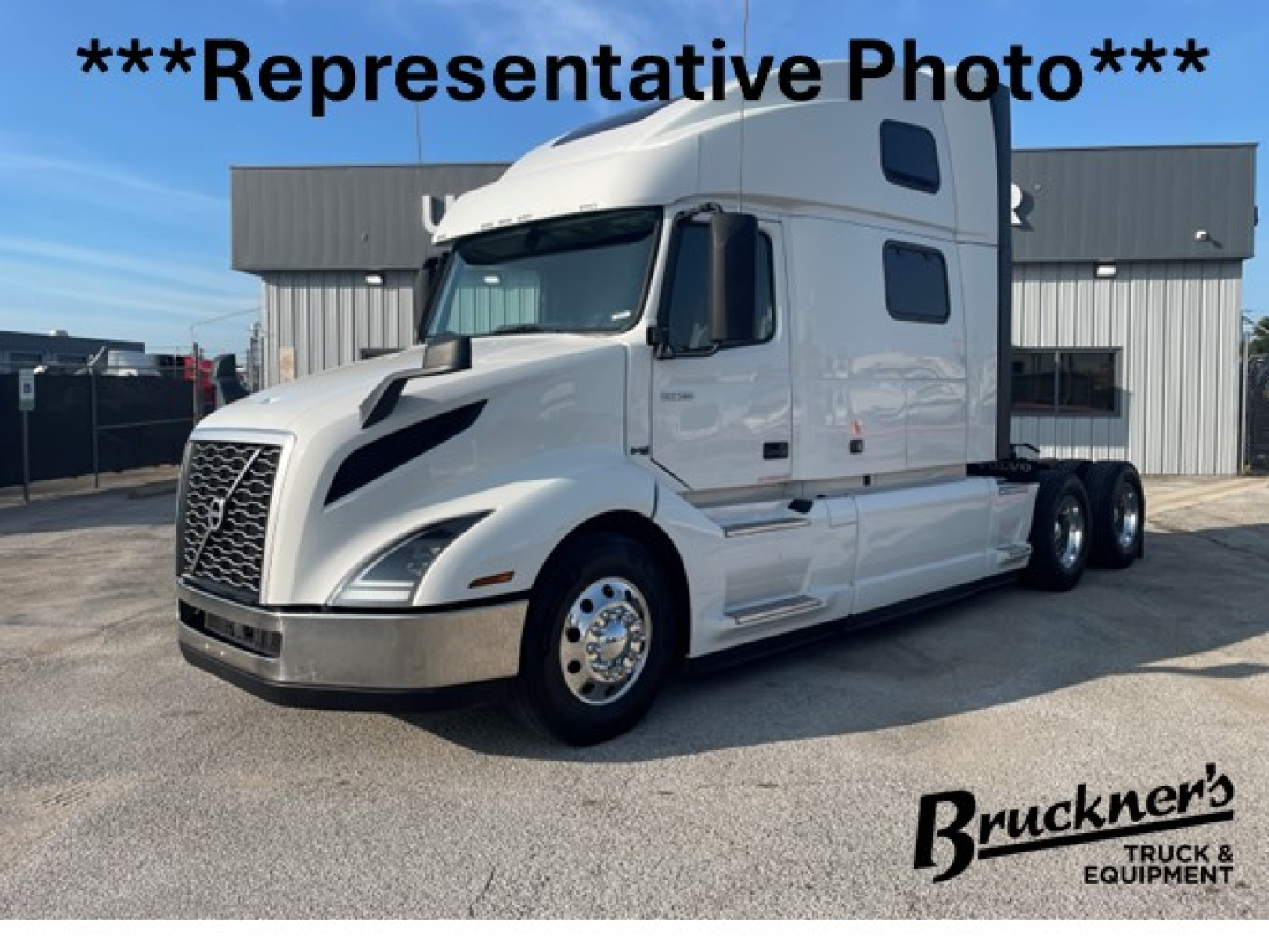 Volvo VNL64T860 truck side view showing sleeper cab and chrome front grille with Harley-style hood.