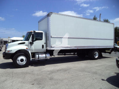 Box truck with a white cab and large gray box body, International MV model, side view showing front wheels and cargo box.