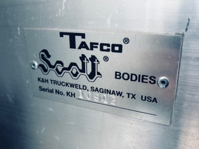 Plate showing Tafo? Tacfo? along with Sculpt? K&H Truck Werld, Saginaw, TX USA Serial No. K H 10912. BODIES. METAL plate attached to truck body.