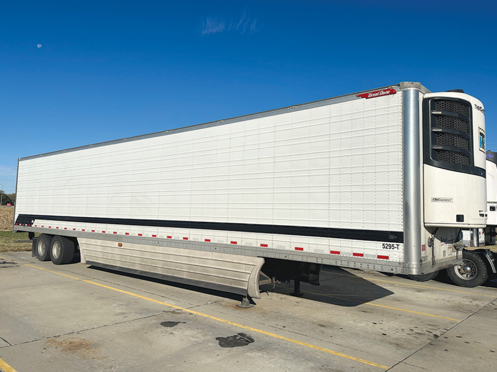Great Dane Everest SS reefer trailer with white insulated body and black undercarriage, refrigerated unit at front, two rear axles, no visible damage.