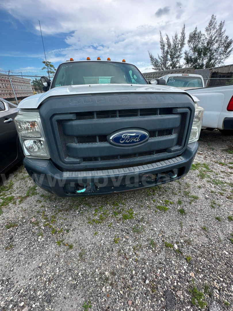 Ford F-350 front view showing large grille with Ford emblem and headlights.