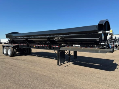 Jet 40' air ride side dump trailer shown in side view with tandem axles and support stands.