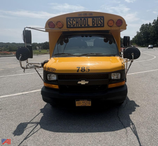 Front view of a yellow 2017 Chevrolet Thomas Express G4500 school bus with 'SCHOOL BUS' sign, number 785, and mirrors.