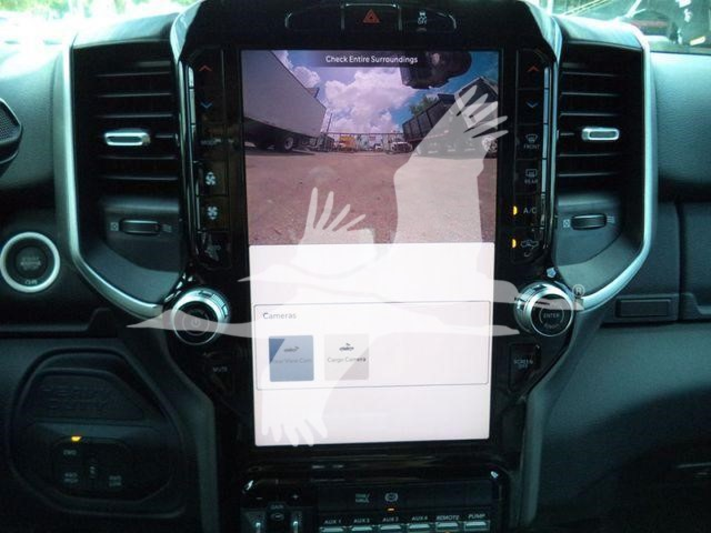 Ram 5500 dashboard center touchscreen display showing backup camera view and UI elements.