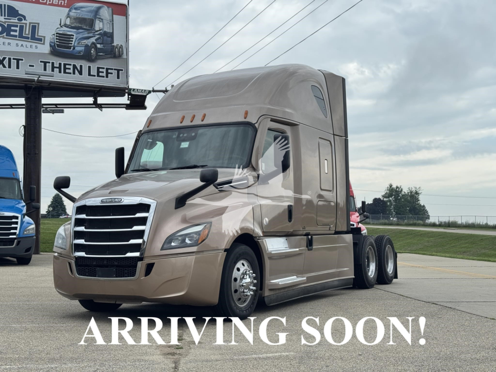 2023 Freightliner Cascadia 126 tractor with beige paint, sleeper cab, text superimposed 'ARRIVING SOON!' on front lower area.