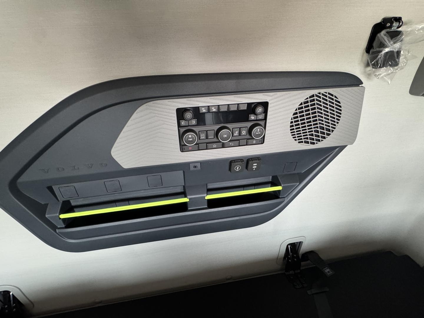 Volvo VNL64T860 interior door panel showing control panel and storage pockets