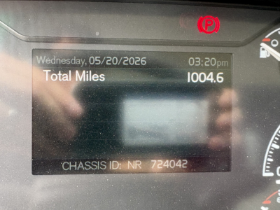 Volvo VHD84F300 truck instrument display showing total miles 1004.6, date Wednesday 05/20/2026, time 03:20pm, chassis ID NR 724042.