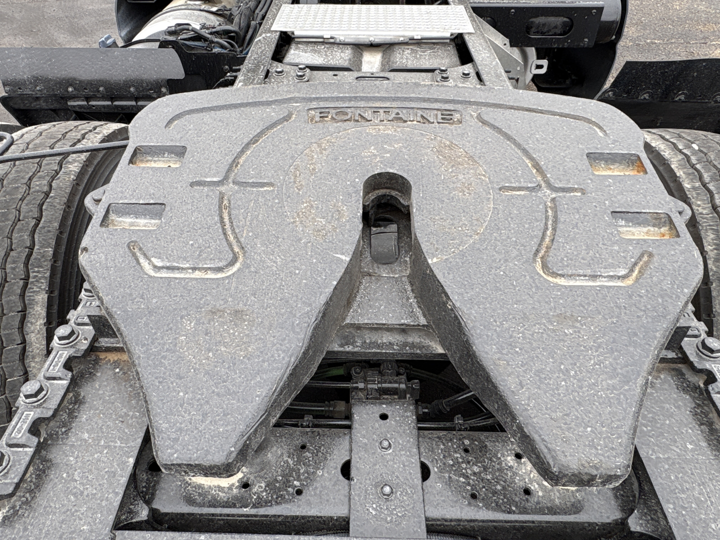 Top view of a Freightliner/Fontaine 2021 International LT625 chassis showing fifth wheel area and drivetrain components.