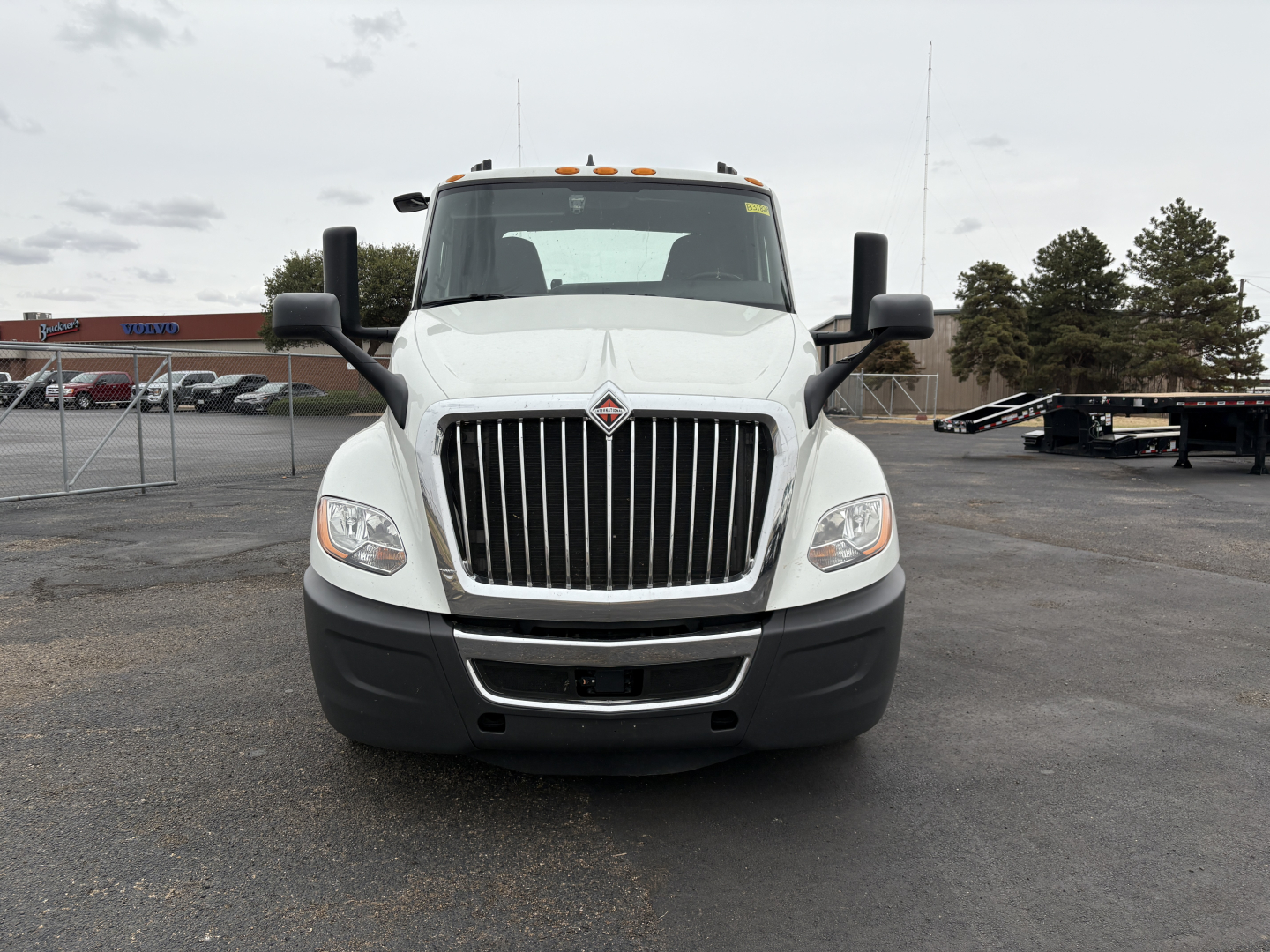 International LT625 conventional daycab truck front view showing grille, headlights, and bumper.
