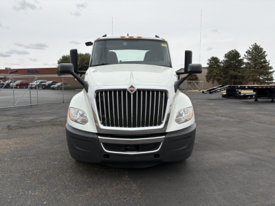 International LT625 conventional daycab truck front view showing grille, headlights, and bumper.