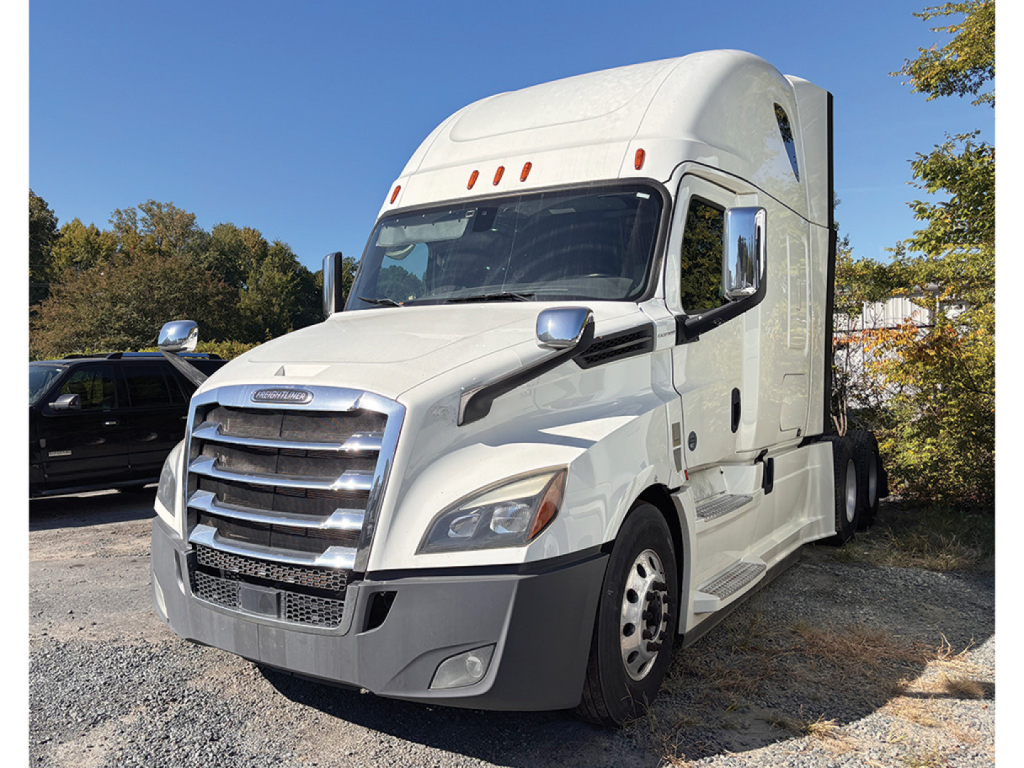 Freightliner Cascadia126 semi-truck tractor cab in white, front-left view, with chrome grille and large aerodynamic mirrors.
