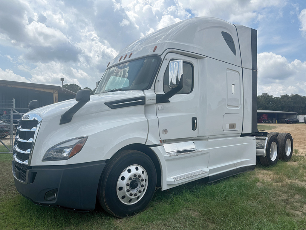 Freightliner Cascadia126 tractor cab side view showing chrome mirrors and sleeper cab. Image contains no legible labels or fluid reservoirs visible.