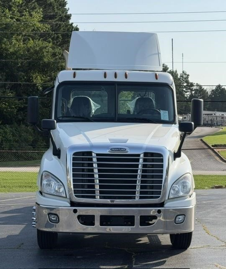 Front view of 2019 Freightliner Cascadia 126 day cab truck showing large front grille, headlights, and chrome bumper.