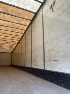 Interior of a 2014 Wabash van trailer showing empty cargo area with sidewalls and ribs.