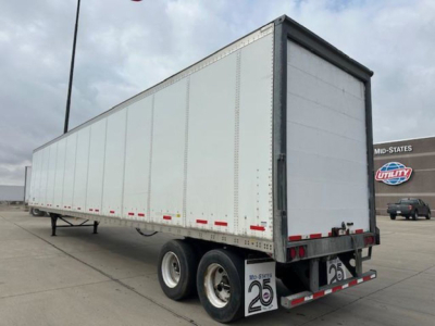 Trailer showing a white Wabash 2014 van with dual rear axles and a ramp door, stock U90822, VIN 1JJV532D8EL812538.