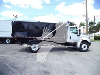 2019 International 4300 roll-off truck with white cab and black container, side view, VIN 1HTEUMML3KH322676 on listingCard overlay.