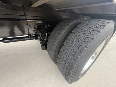 Kenworth T270 truck axle and dual rear tires showing suspension and frame undercarriage.