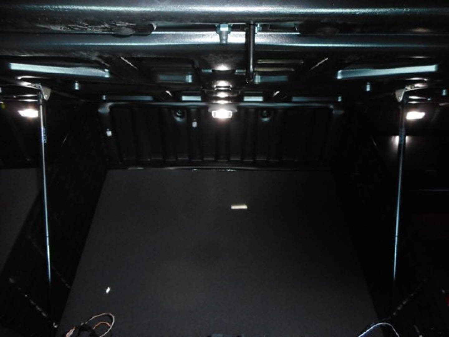 Freightliner Cascadia 126 engine bay view showing undercab cabin area with structural framework
