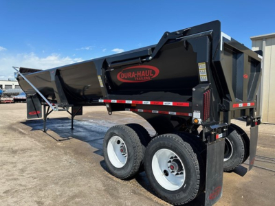 Dura-Haul rock trailer end dump with frameless body showing black paint, dual rear wheels, and red Dura-Haul logo.