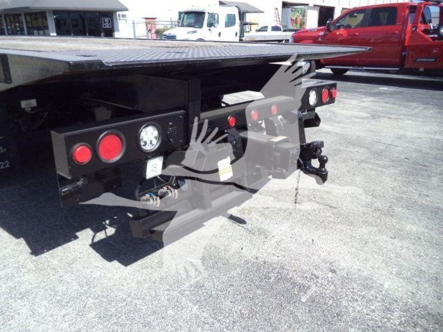 peterbilt 567 rollback truck rear showing bumper lights and hitch components