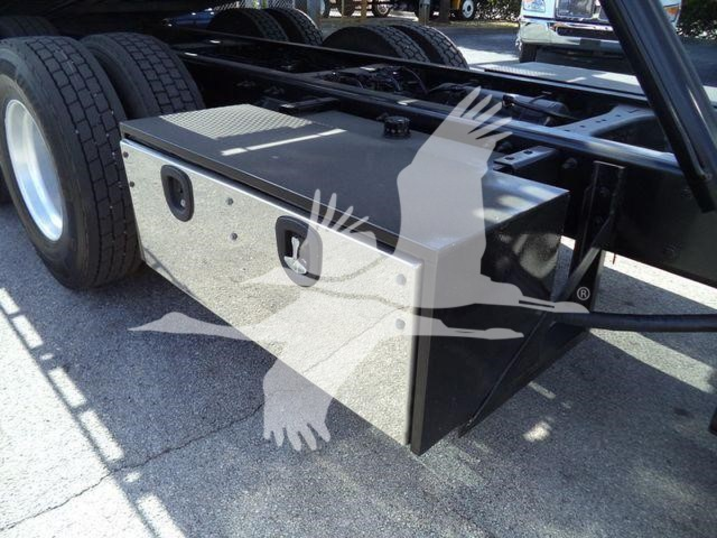 Peterbilt 567 truck chassis with toolbox undercarriage and dual rear wheels visible