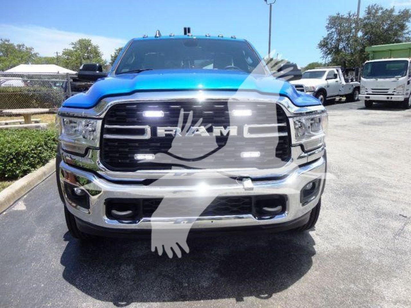 Ram 4500 SLT front view showing chrome grille, headlights, and bumper.