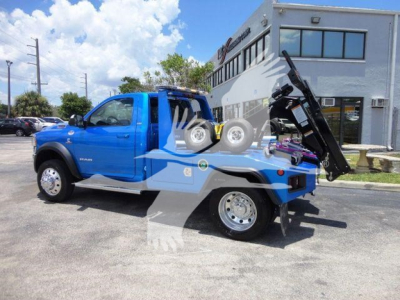 Blue Ram 4500 tow truck with integrated winch equipment showing front and side view, stock number J33417FM.