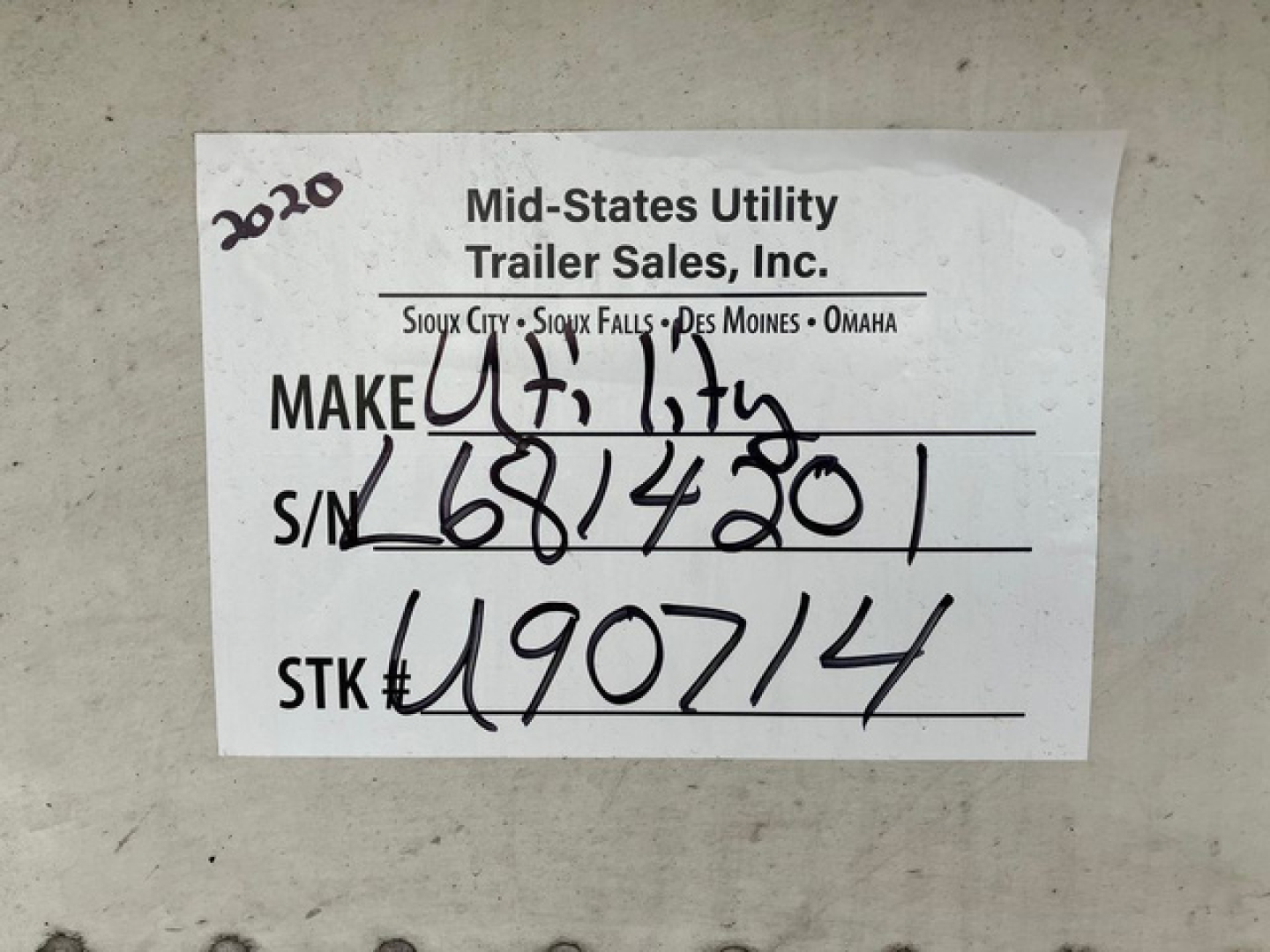 Label on a 2020 Mid-States Utility trailer showing Make, S/N, and STK numbers. Text includes 'Mid-States Utility Trailer Sales, Inc.' and handwritten numbers.