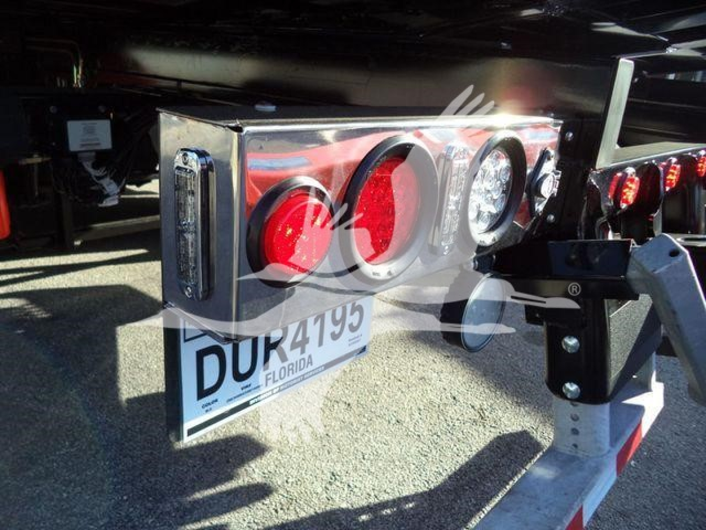 Kenworth T280 rollback chassis rear: taillights and bumper with license plate visible
