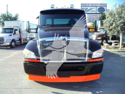 Front view of a 2025 Kenworth T280 rollback truck showing grille, headlights, bumper with orange lower lip, and black hood.