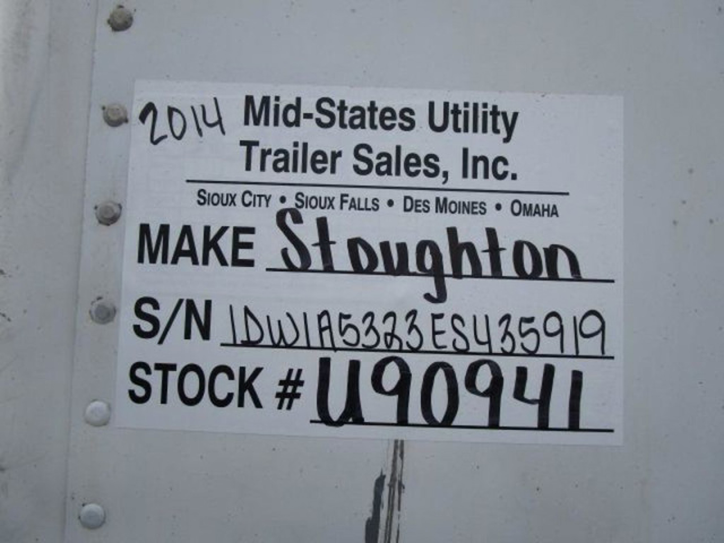 Label showing manufacturer and stock information: '2014 Mid-States Utility Trailer Sales, Inc.' with locations listed; S/N 1DW1A5323ES435919; STOCK # U90941; handwritten MAKE Stoughton.