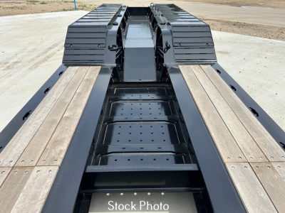 Load King 554 quad-9' wide lowboy trailer side frames with wooden deck and central channel