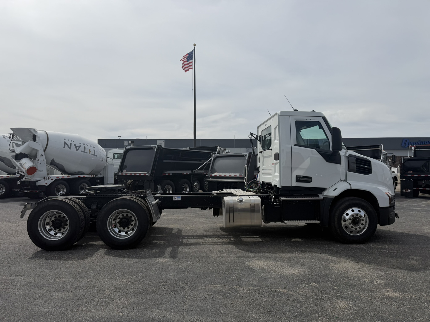 Mack AN64T truck chassis side view with cab and fuel tanks