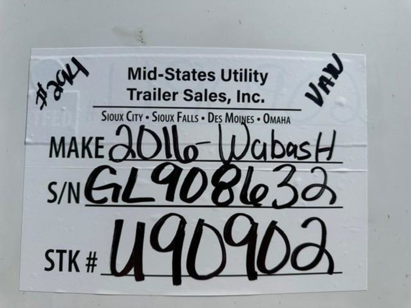 Trailer identification tag on Wabash van showing Make 2016 Wabash, VIN 1JJV532D5GL908632, S/N GL9081632, STK # U90902 from Mid-States Utility Trailer Sales, Inc. with handwritten details.