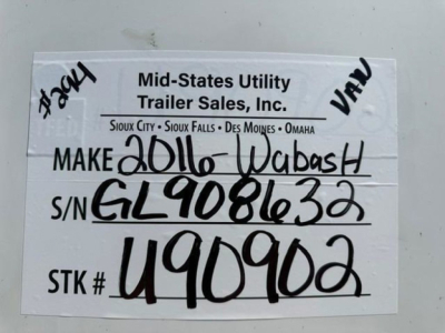 Trailer identification tag on Wabash van showing Make 2016 Wabash, VIN 1JJV532D5GL908632, S/N GL9081632, STK # U90902 from Mid-States Utility Trailer Sales, Inc. with handwritten details.