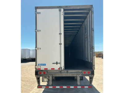  trailer interior rear view showing open doors of a Stoughton trailer with VIN JS779015 and stock 550061