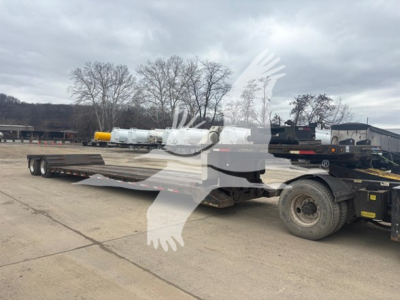 XL Specialized XL80MDE double drop expandable trailer on a flatbed truck