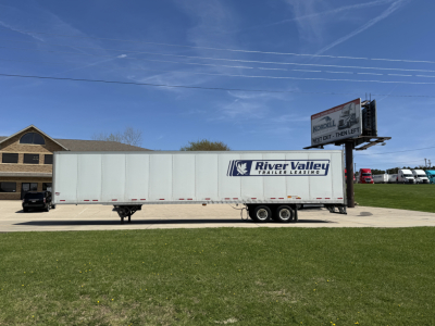 Wabash Duraplate trailer side view showing River Valley Trailers Leasing logo and tri-axle wheels.