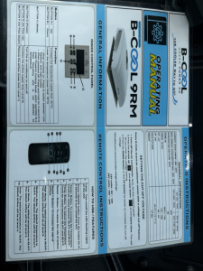 B-Cool XPERRM general information label on a truck showing OEM operating instructions and warranty diagram with a digital display panel and various instruction panels.