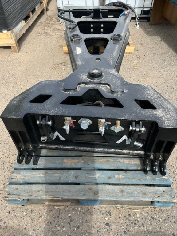 ASB1 spreader bar frame showing hydraulic hookups and control valves on front end of 55-ton trailer assembly.