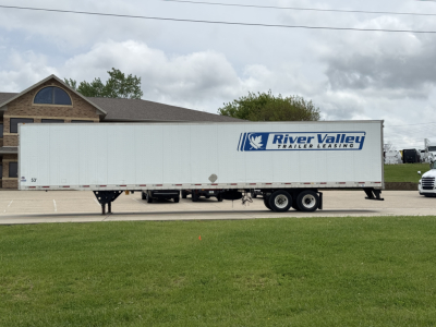 Trailer side showing River Valley Trailers Leasing logo on a white long box trailer.
