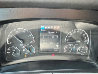 Dashboard of a 2022 Freightliner Cascadia 126 showing instrument clusters, digital display, and gauges.