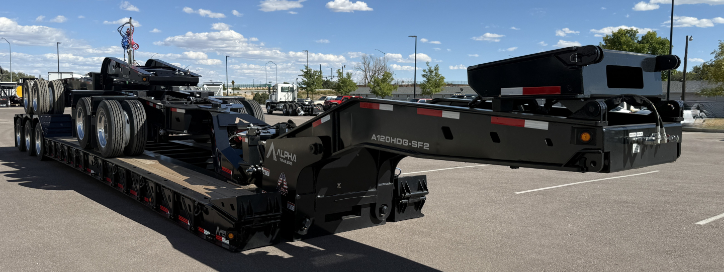 Trailer showing Alpha A120HDG-SF2 lowboy trailer with multi-axle gooseneck and low deck, parked in lot.