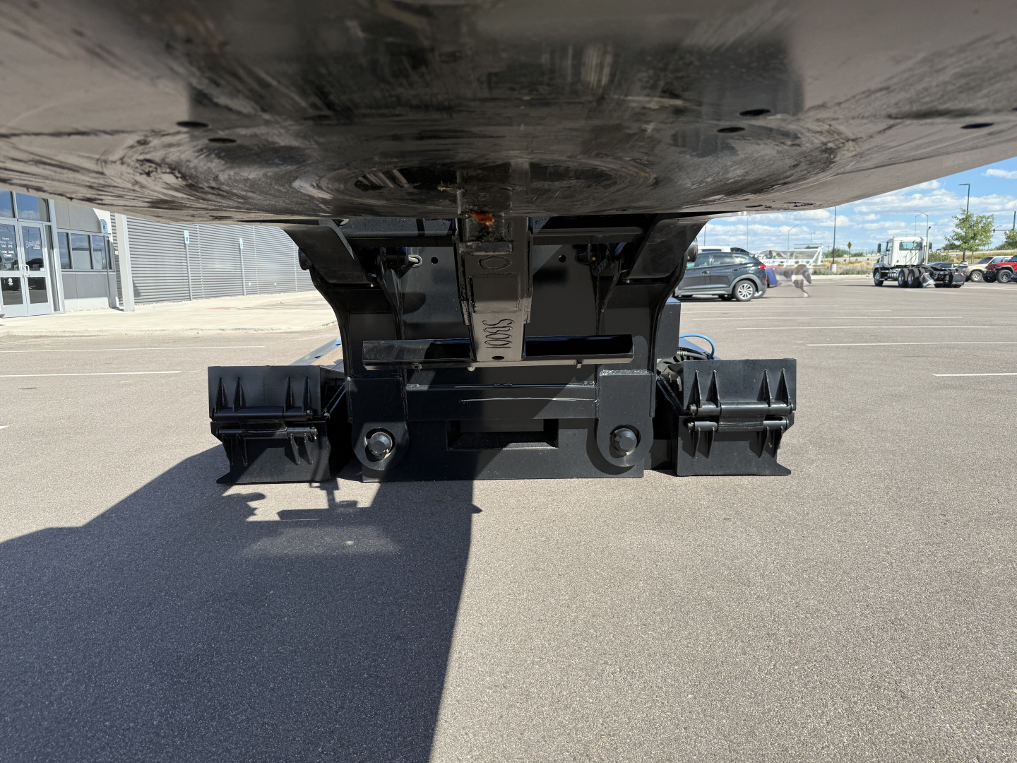 Alpha A120HDG-SF2 undercarriage showing rear hitch assembly and dual skids