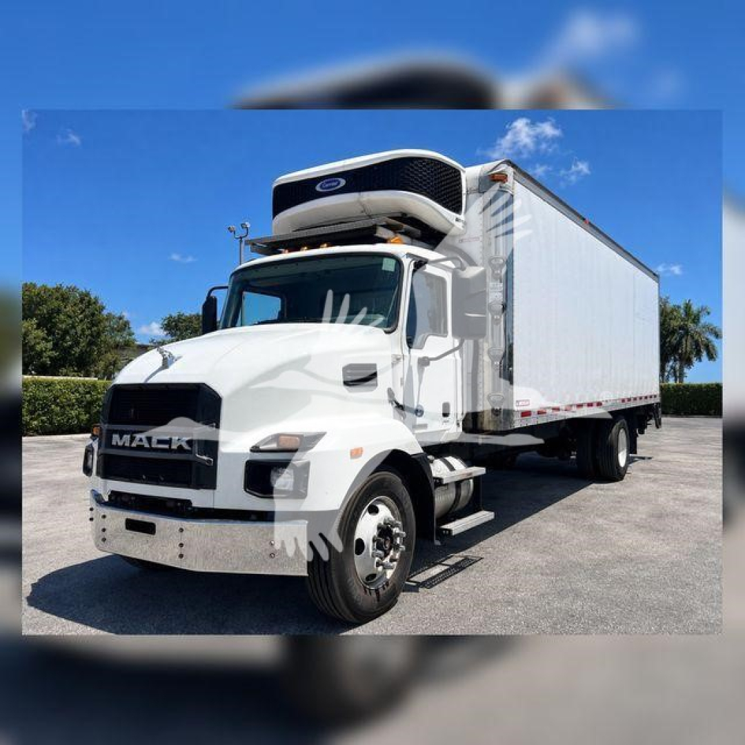 Mack MD6 refrigerated truck in-view showing front grille, cab, and cargo box with rooftop refrigeration unit.