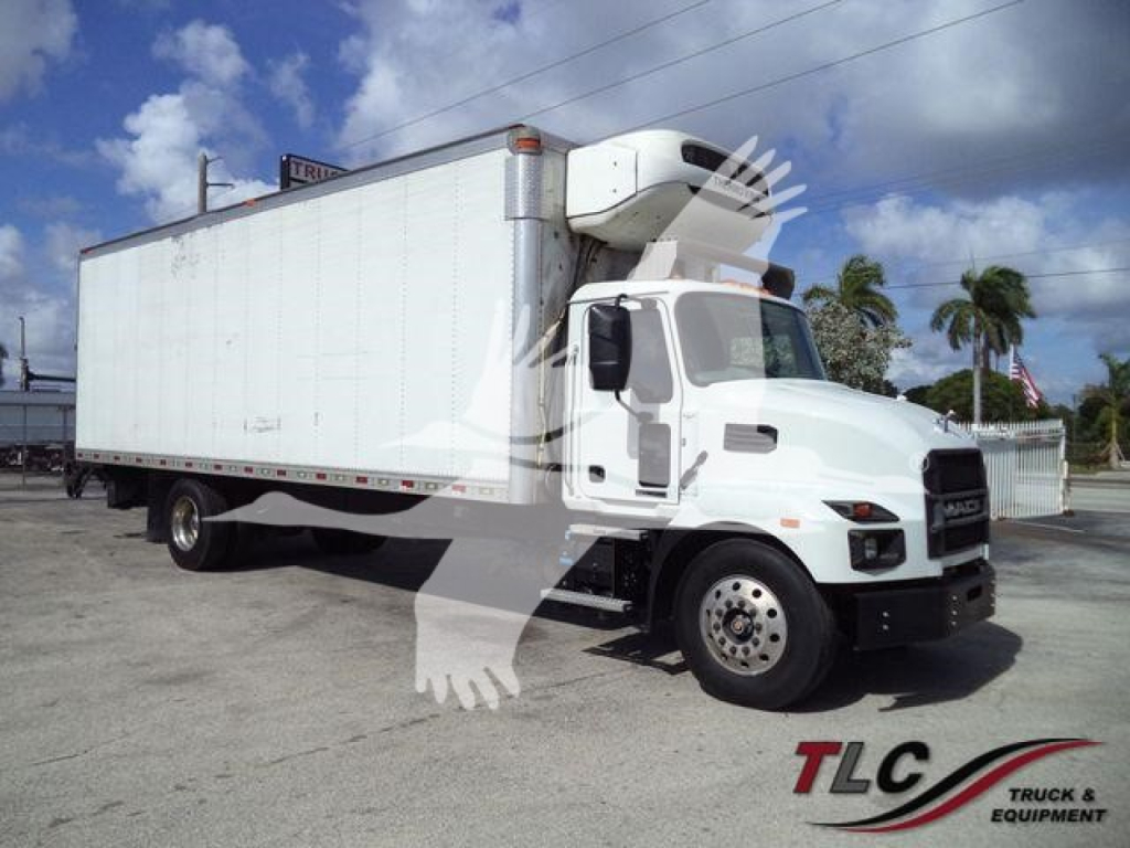 Mack MD6 refrigerated truck showing side view with cargo box and cab, VIN 1M2MDBAA2PS006384 visible.