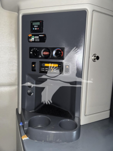 Peterbilt 579 interior dash area with gauges and controls in view.